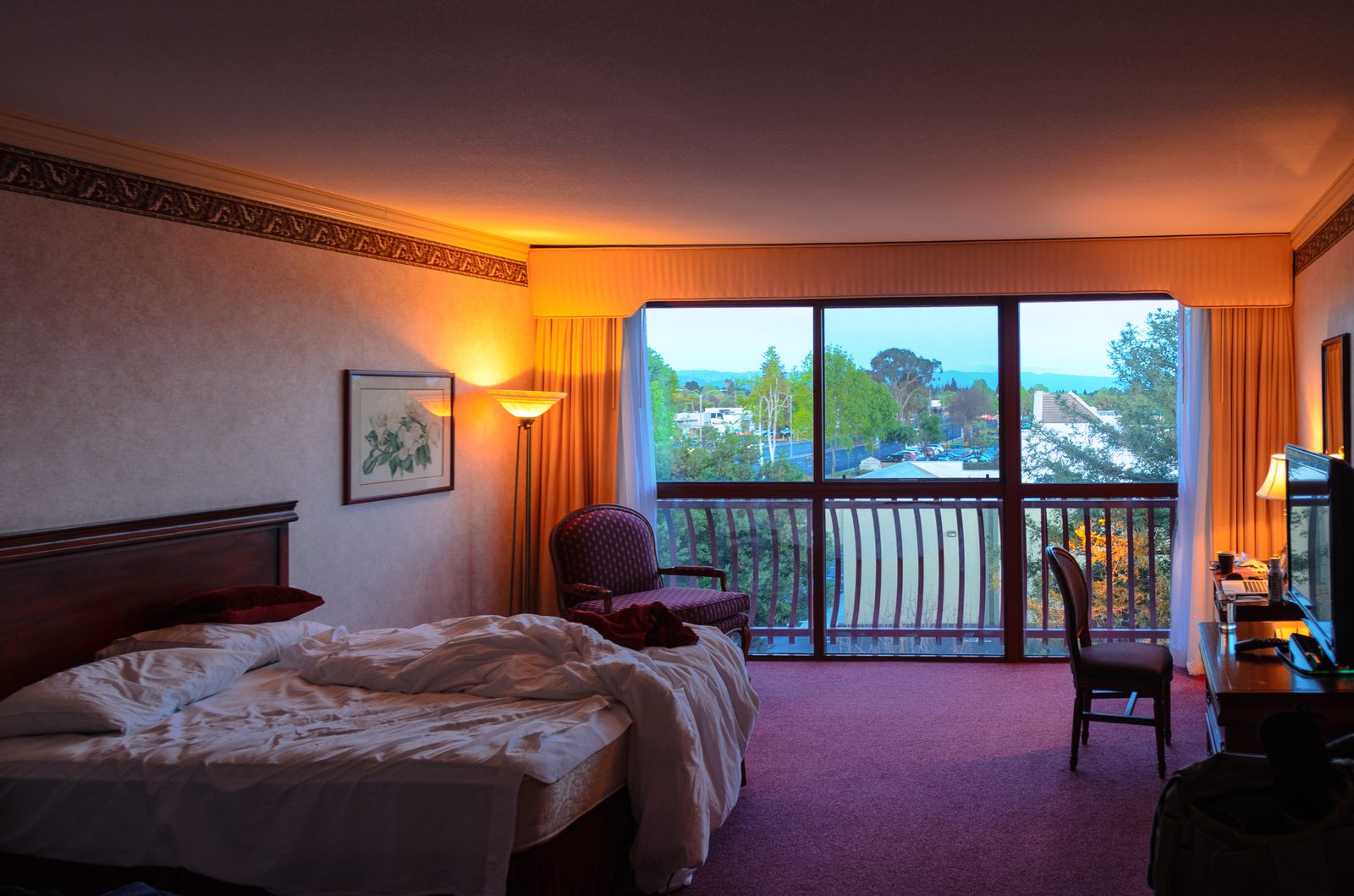 Generic hotel bedroom interior for context